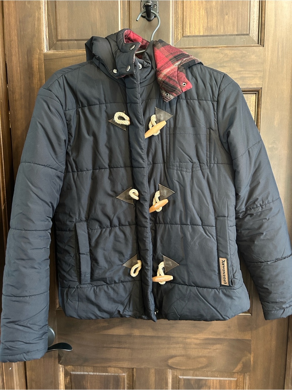 Legendary Whitetails Black Toggle Puffer Jacket with Red Plaid Lining